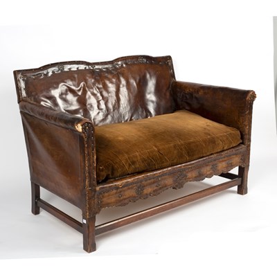 Lot 74 - A leather sofa and two matching armchairs