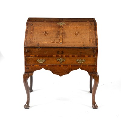 Lot 81 - A George III provincial oak bureau, the...