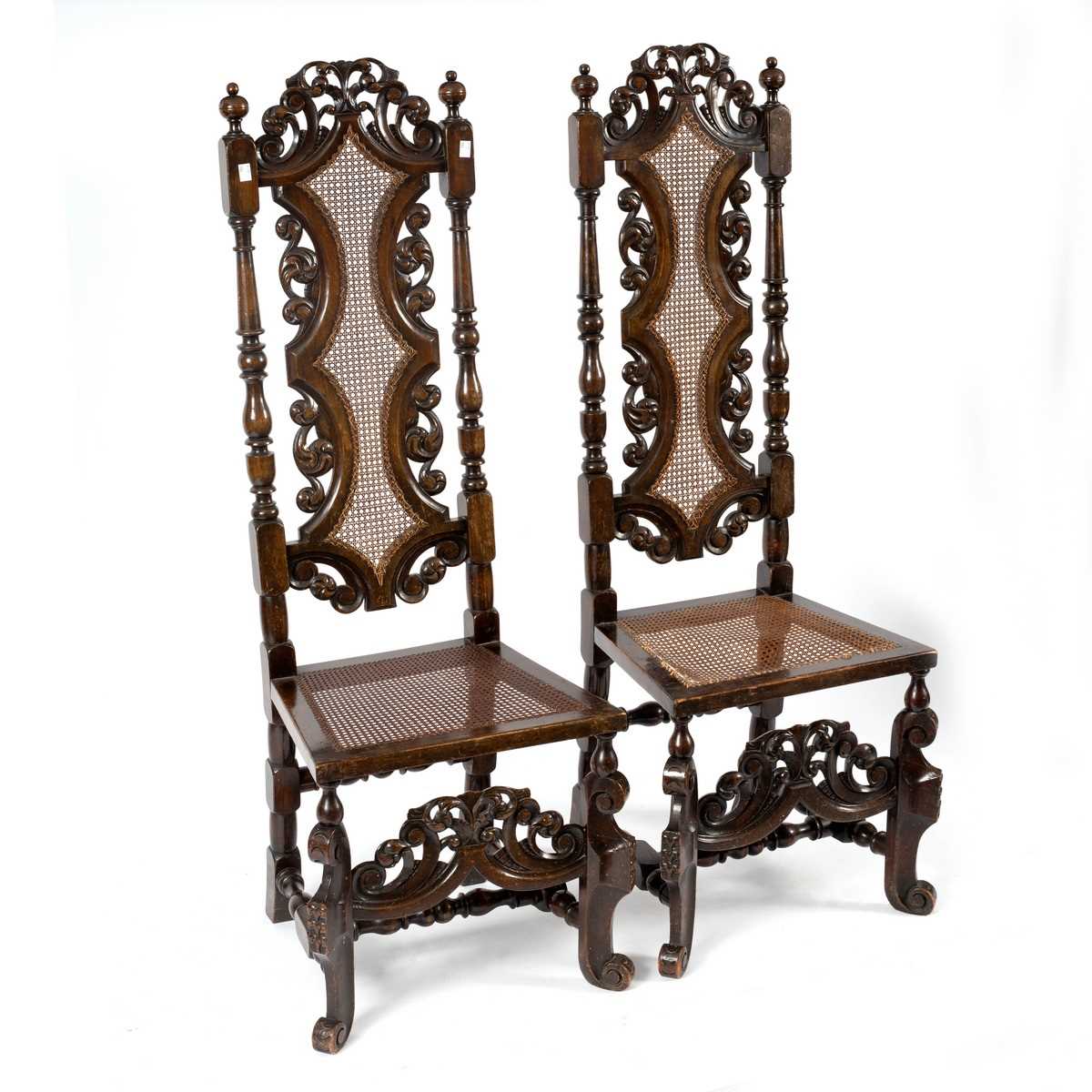 Lot 91 - A pair of high back chairs of Carolean design...