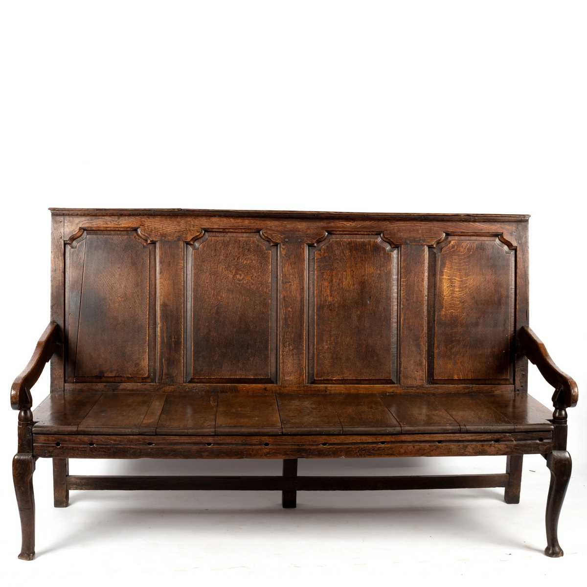 Lot 92 - An early Georgian Lancashire oak settle, the...
