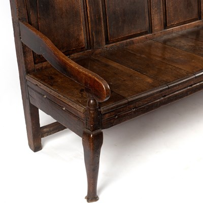 Lot 92 - An early Georgian Lancashire oak settle, the...