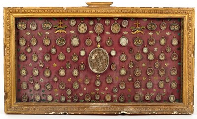 Lot 600 - A collection of ninety-three reliquaries, each...