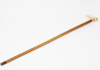 Lot 617 - A Victorian malacca walking cane with silver...