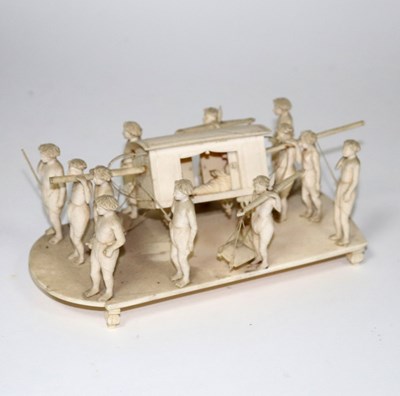 Lot 622 - An Indian carved ivory figure group, Company...