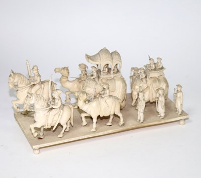 Lot 623 - An Indian carved ivory figure group, Company...