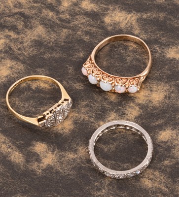 Lot 74 - A platinum and diamond eternity ring