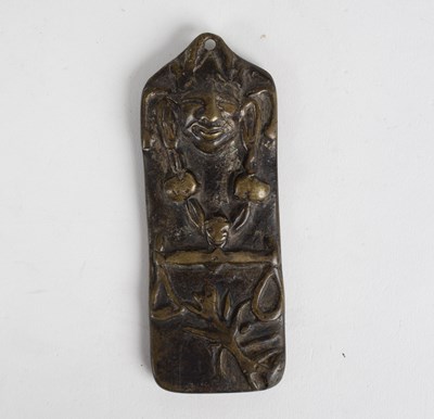 Lot 260 - An Indian medallion with grotesque mask to one...