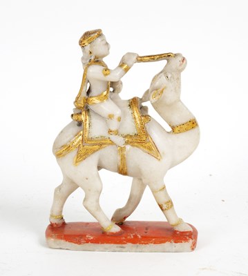 Lot 386 - An Indian carved alabaster and gilt figure on...