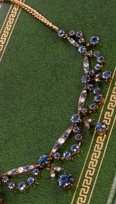 Lot 121 - An Edwardian yellow gold, diamond and sapphire collarette necklace