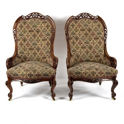 Lot 763 - A pair of Victorian fireside chairs with...