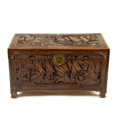 Lot 785 - An Oriental carved camphorwood chest, 104cm wide