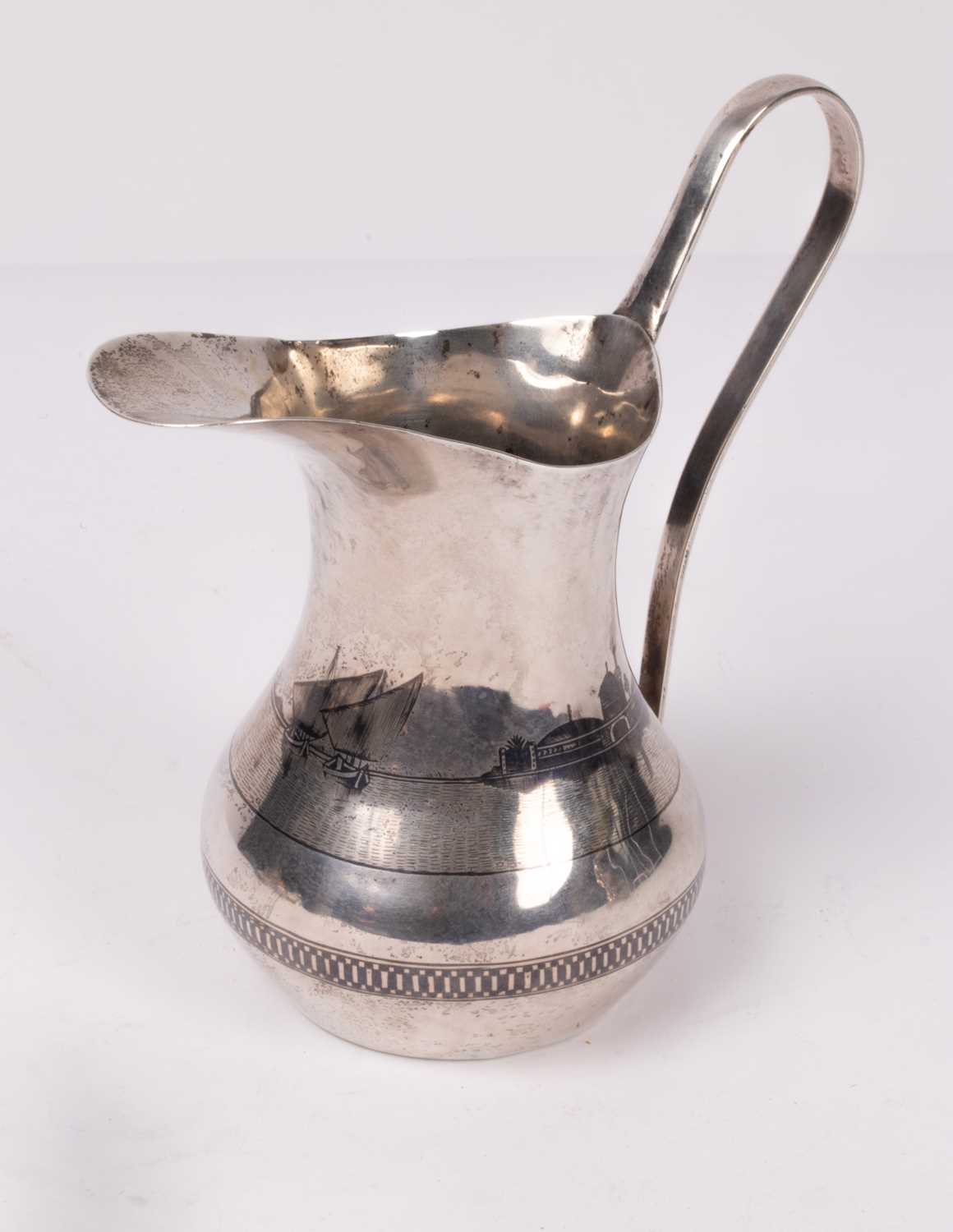 Lot 61 - An Iraqi niello ware jug