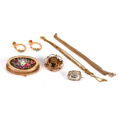Lot 23 - A citrine brooch, of circular shape in a 9ct...