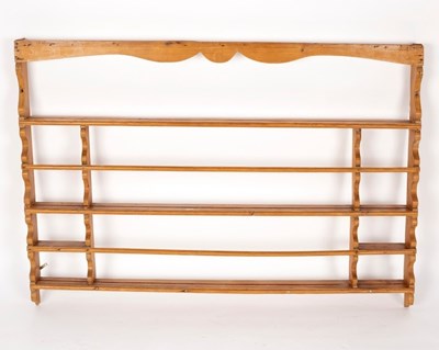 Lot 571 - A set of pine hanging shelves, 134cm wide