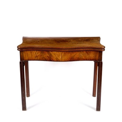 Lot 597 - A George III serpentine front card table, on...