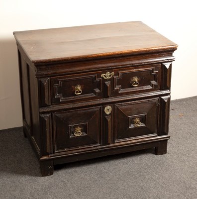 Lot 723 - A Charles II oak two-drawer chest, circa 1680,...