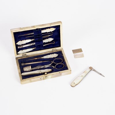 Lot 22 - A mother of pearl and silver necéssaire,...