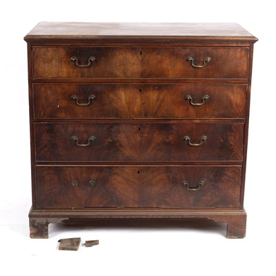Lot 677 - A George III mahogany chest of four long...