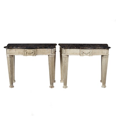 Lot 719 - A pair of painted console tables with Portor...