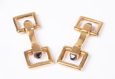 Lot 94 - A pair of Cartier yellow metal and sapphire cufflinks