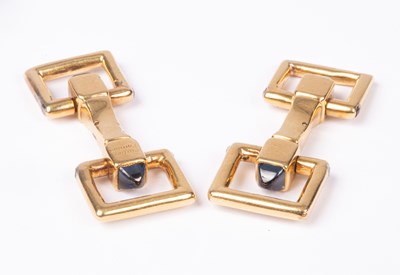 Lot 94 - A pair of Cartier yellow metal and sapphire cufflinks
