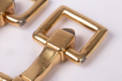 Lot 94 - A pair of Cartier yellow metal and sapphire cufflinks