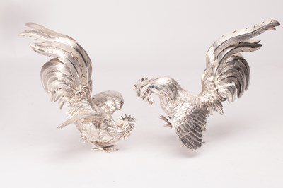 Lot 164 - Two silver table cockerels