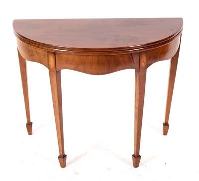 Lot 721 - A George III mahogany half-round tea table,...