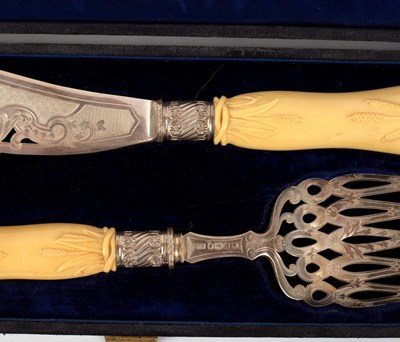 Lot 10 - A pair of Victorian silver fish servers, H H,...