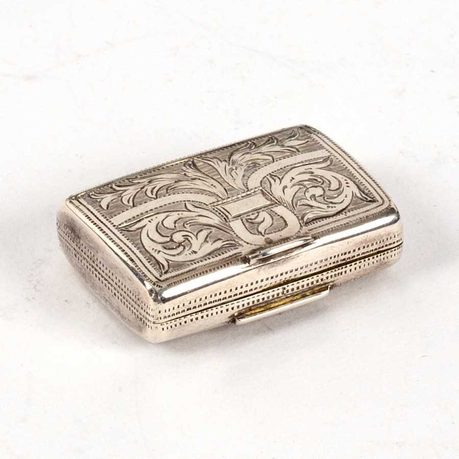 Lot 23 - A George IV miniature silver vinaigrette,...