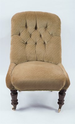 Lot 319 - A Victorian deep buttoned back chair on turned...