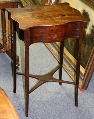 Lot 320 - A Regency mahogany worktable with serpentine...