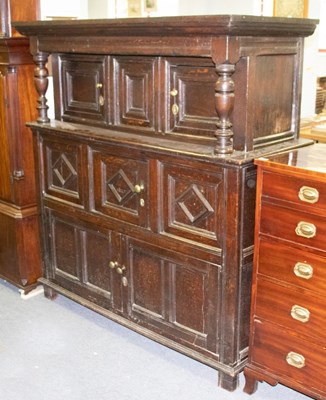 Lot 322 - An 18th Century oak court cupboard enclosed by...
