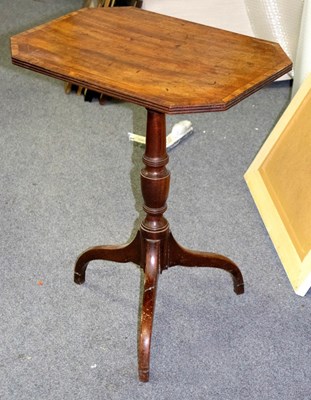 Lot 323 - An early 19th Century mahogany table on a...