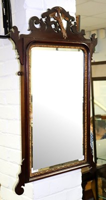 Lot 354 - A George II style mahogany fret framed mirror,...