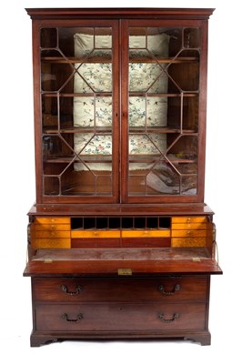 Lot 360 - A George III mahogany secretaire bookcase,...