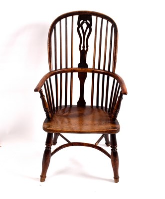 Lot 371 - A yew and elm Windsor armchair, with a...