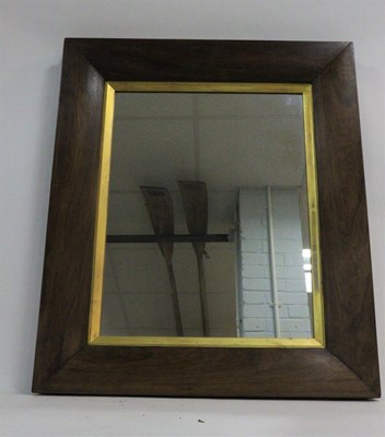 Lot 394 - A rosewood framed mirror, the oblong plate...