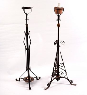 Lot 406 - A wrought iron telescopic standard lamp and...