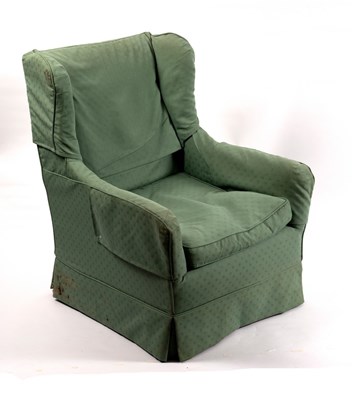 Lot 409 - A square frame wing back chair fitted a loose...