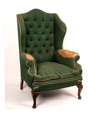 Lot 421 - A Queen Anne style wing armchair on cabriole...