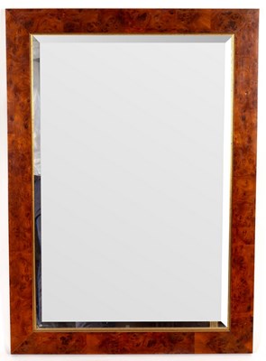 Lot 429 - A burr walnut framed wall mirror, fitted a...