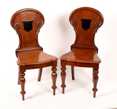 Lot 440 - A pair of Victorian mahogany hall chairs, the...