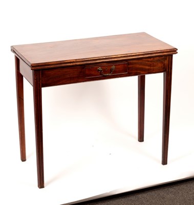 Lot 444 - A George III mahogany tea table, fitted a...
