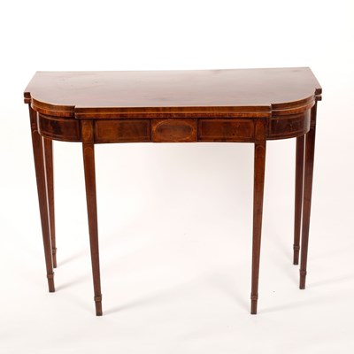 Lot 455 - A George III mahogany fold over card table,...