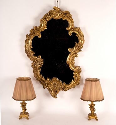 Lot 463 - A Rococo style gilt framed mirror, 80cm high...