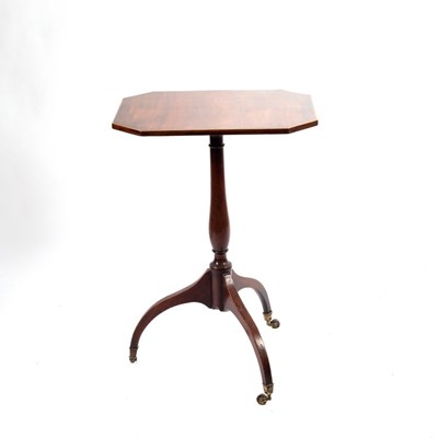 Lot 467 - A Regency mahogany lamp table, the canted...