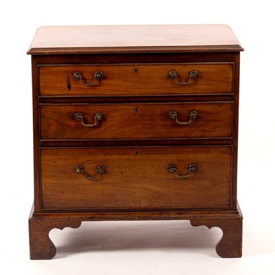 Lot 475 - A George III mahogany chest of three drawers...
