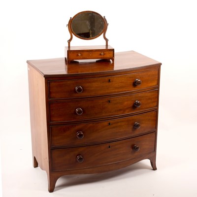 Lot 481 - A Regency mahogany bowfront chest of four long...