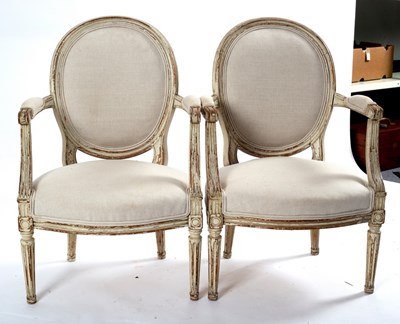 Lot 490 - A pair of Louis XVI style fauteuils, each with...